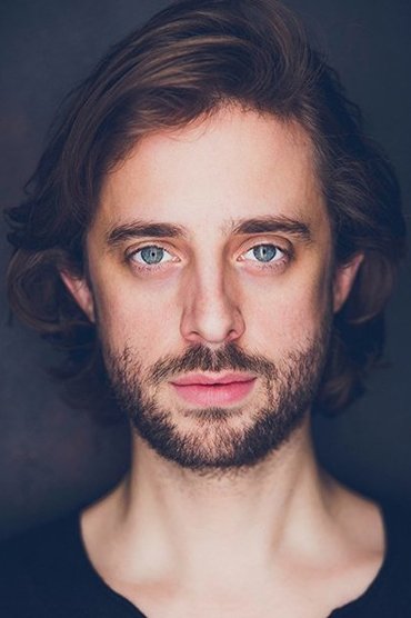 Professional headshot of Sebastian Beacon