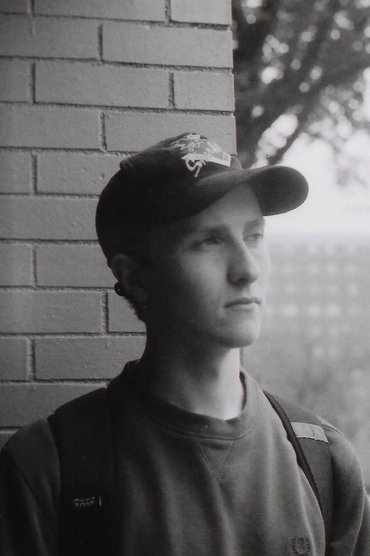 Professional headshot of Cody Chandler
