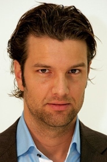Professional headshot of Bas Muijs
