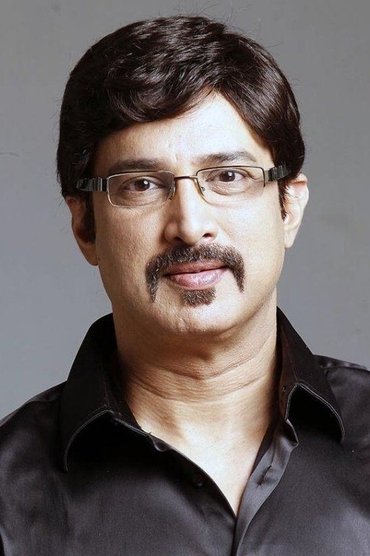 Professional headshot of Suresh