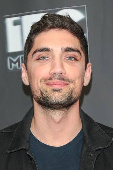 Professional headshot of George Finn