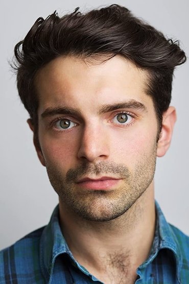 Professional headshot of Ludovic Hughes