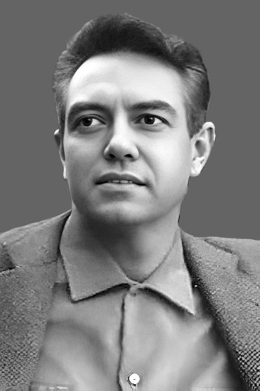 Professional headshot of Alberto Dalbés