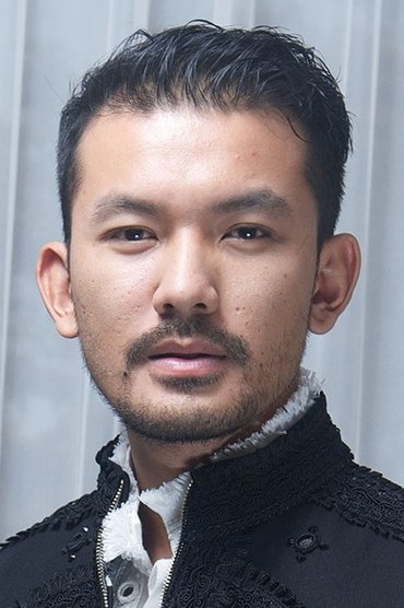 Professional headshot of Rio Dewanto