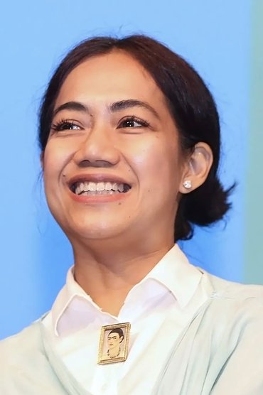 Professional headshot of Nia Dinata