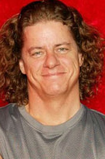 Professional headshot of Alex Sanders