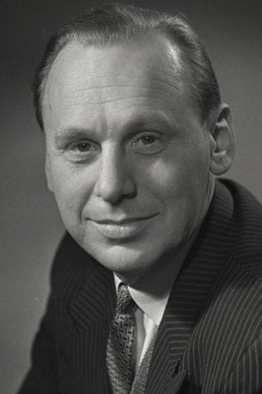 Professional headshot of Grigori Kromanov