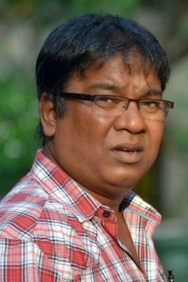 Professional headshot of Kishore Kadam