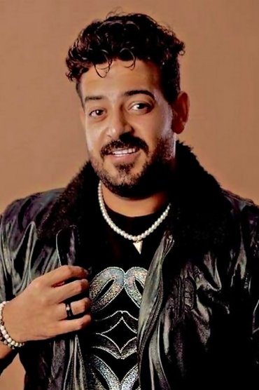Professional headshot of Ismail Ellithy