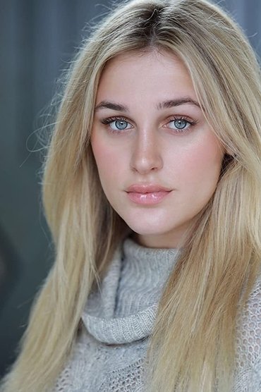 Professional headshot of Madi Monroe