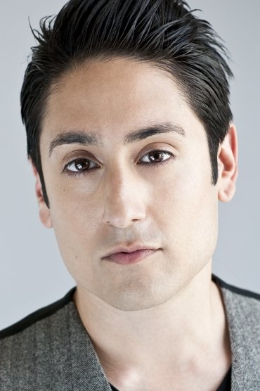 Professional headshot of Omar Doom