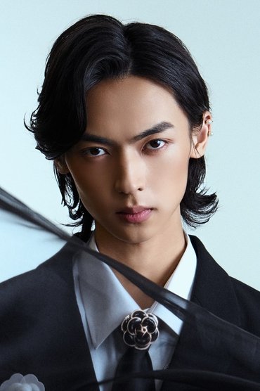Professional headshot of Anson Chen