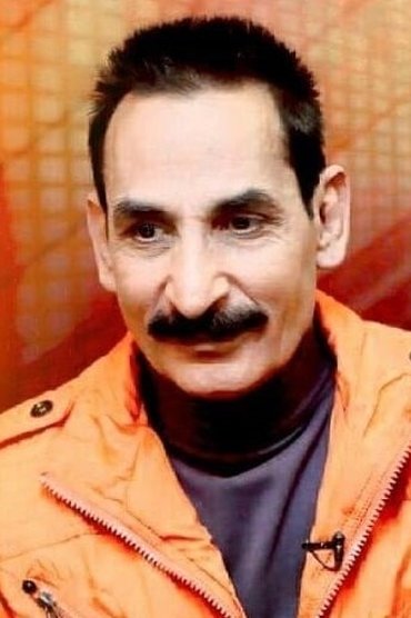 Professional headshot of Iftikhar Thakur