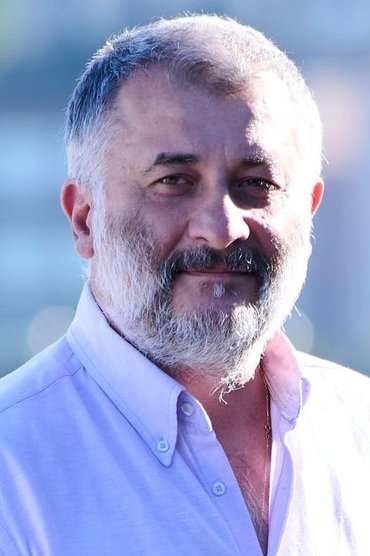 Professional headshot of Cristi Puiu
