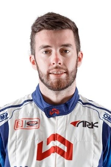 Professional headshot of James Deane