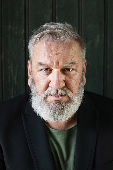 Professional headshot of Wim Opbrouck