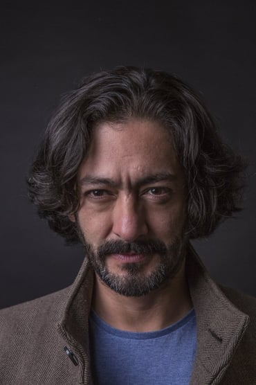 Professional headshot of Hamlet Ramírez