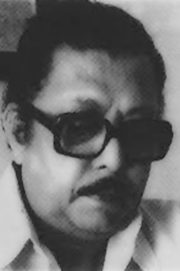Professional headshot of Jagathy N K Achari