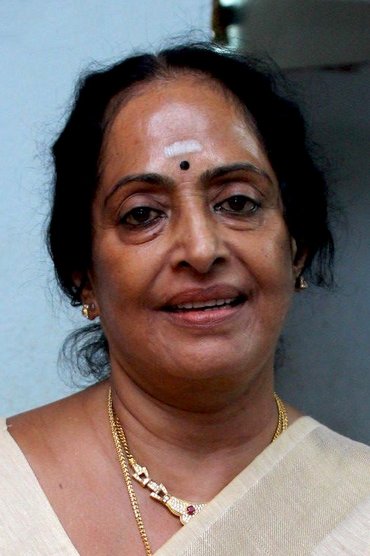 Professional headshot of K R Vijaya