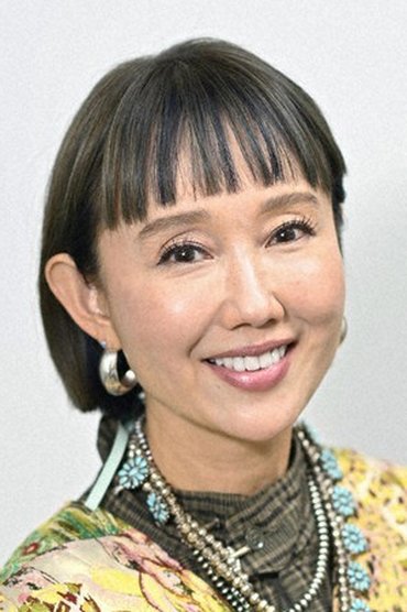 Professional headshot of Youki Kudoh