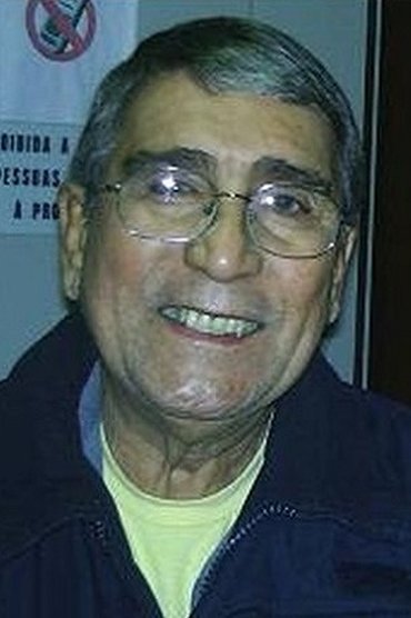Professional headshot of Dino Santana