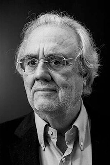 Professional headshot of Manuel Gutiérrez Aragón