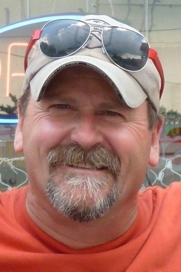 Professional headshot of Randy Butcher