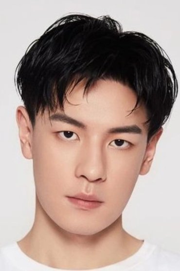 Professional headshot of Tan Quan
