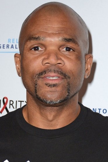 Professional headshot of Darryl 'DMC' McDaniels