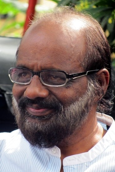 Professional headshot of Lenin Rajendran
