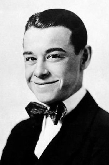 Professional headshot of Johnny Hines
