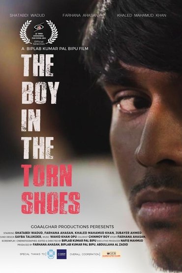 The Boy in The Torn Shoes