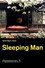 眠る男
