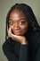 Olivia Nakintu as Rayvenn in Frisky Business