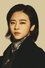 Nan Ji as Huang Xiaoyu in A Dog Barking at the Moon