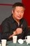 Shi Jian as Interviewer in Tiananmen
