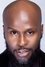 Ikechukwu Onunaku as Sola Akinyemi in The Wedding Party