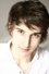 Maxime Flourac as Le réceptionniste in Murder In Luberon