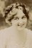 Evelyn Moore as Mrs. Wisby in Bedazzled