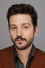 Diego Luna as Postman in Never Too Young to Dream