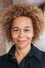 Deborah Odong as Ministry Secretary in Echoes of the Past