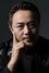 Pang Jing as Director Xie in Winter and Lion