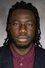 Prince K. Appiah as Sunny Addo in Thuis