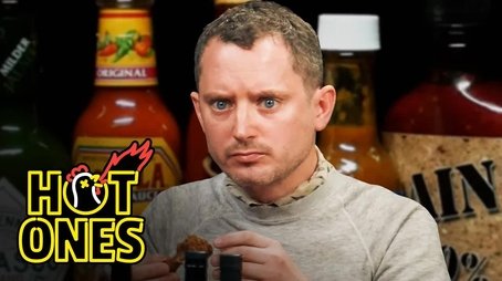 Elijah Wood Tastes the Lava of Mount Doom While Eating Spicy Wings (2021) - Episode 12 poster and promotional image