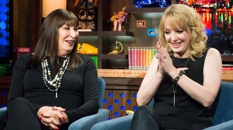 Anjelica Huston & Wendi McLendon-Covey (2014) - Episode 186 poster and promotional image
