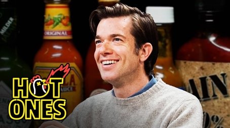 John Mulaney Seeks the Truth While Eating Spicy Wings (2023) - Episode 7 poster and promotional image
