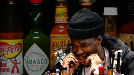 Curren$y Talks Munchies, Industry Games, and Rap Dogs While Eating Spicy Wings (2015) - Episode 1 poster and promotional image
