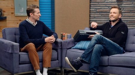 Joel McHale Wears a Navy Zip-up and High Tops (2015) - Episode 13 poster and promotional image