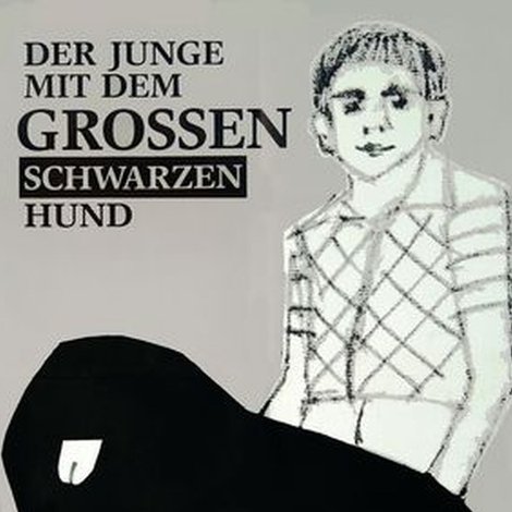 Der Junge mit dem großen schwarzen Hund