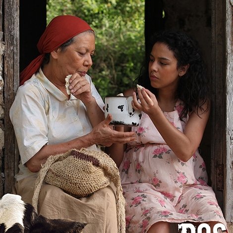 Dos mujeres y una vaca